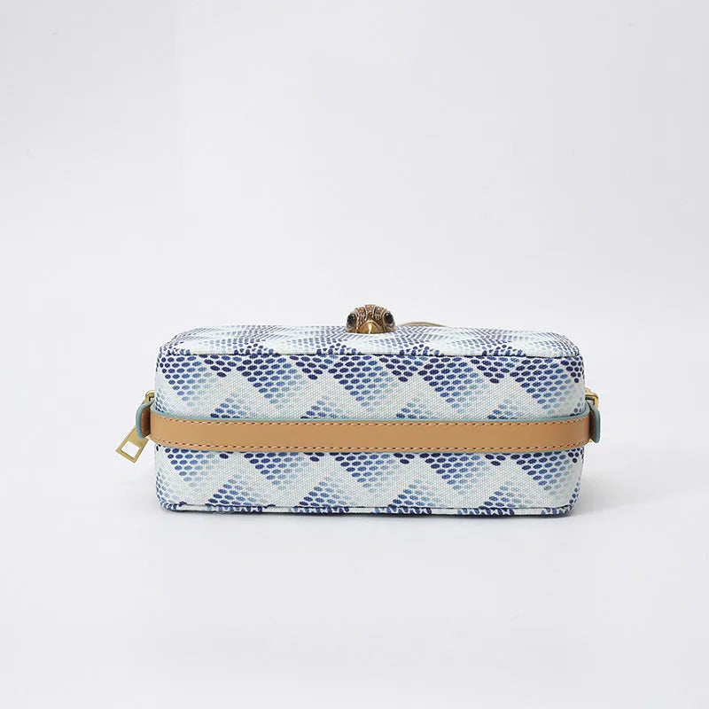Soft PU camera bag with eagle head wide shoulder strap in blue, outer sandwich pocket, horizontal square shape