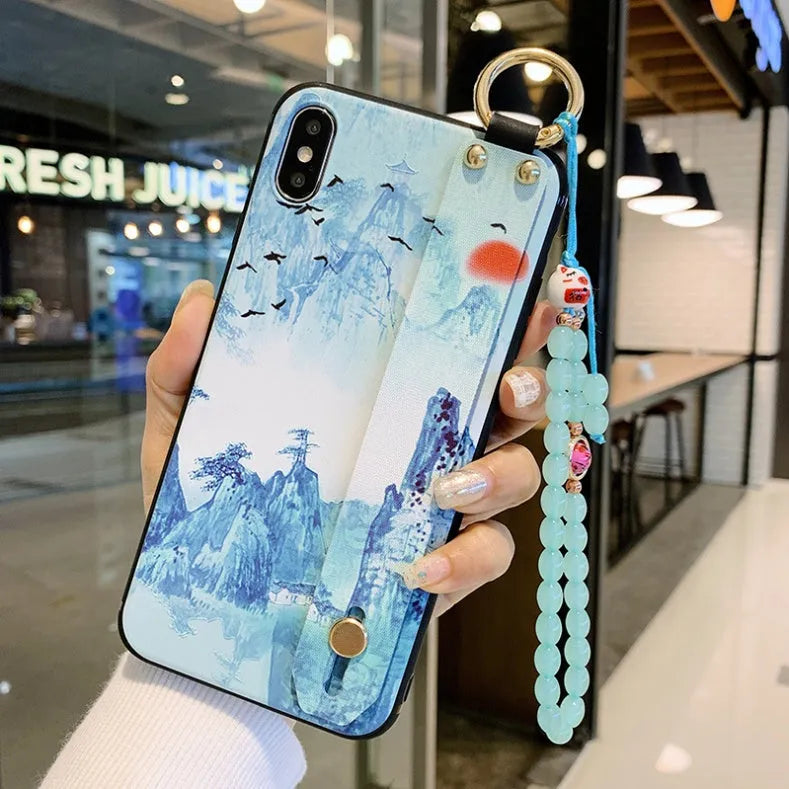 Rose flower patterned wrist strap attached to iPhone case for iPhone 11 Pro Max