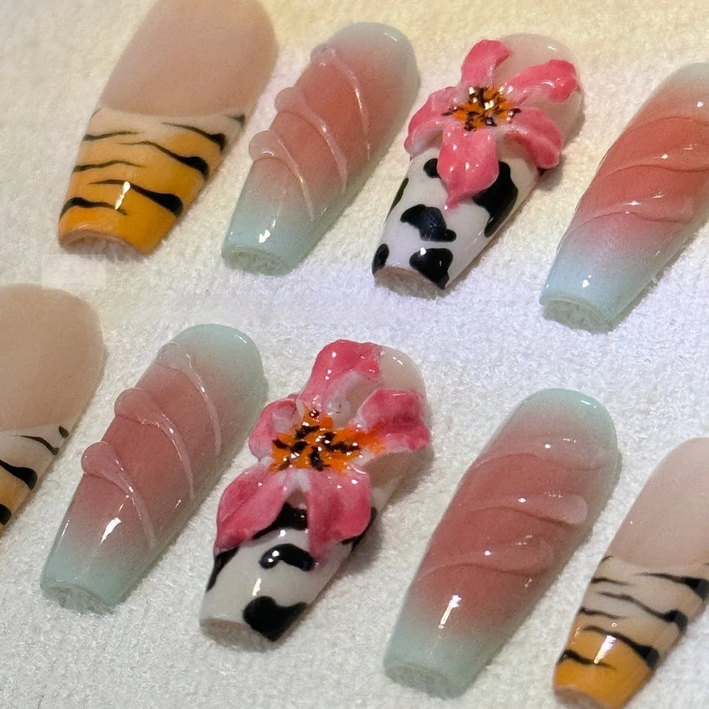 Lily and zebra pattern hand-carved press-on nail art set in a long, wear-resistant style.