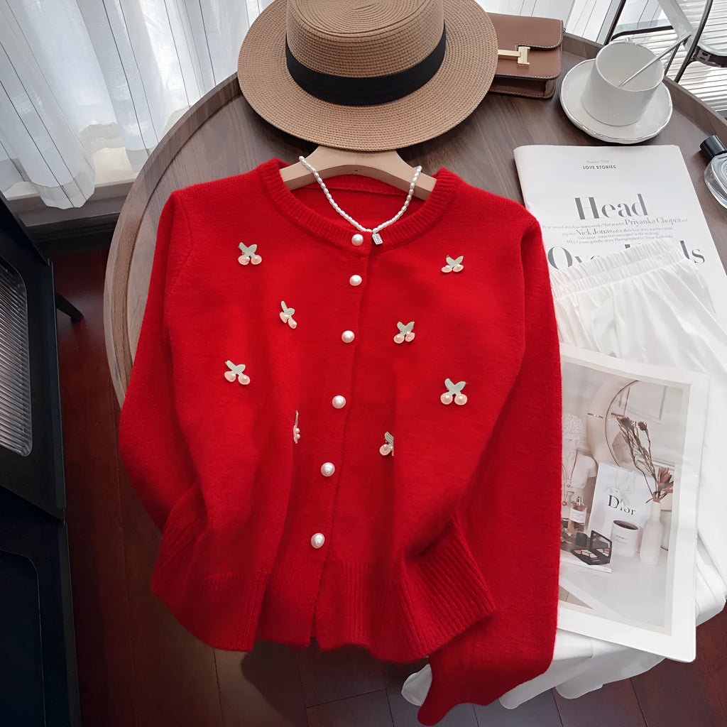 Women's soft pink cashmere blend cardigan coat with round neck, beaded detail, and slim fit.