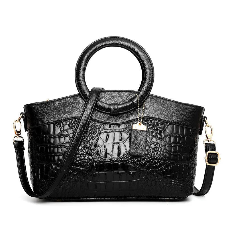Fabric ladies shoulder handbag showing zipper compartments in one of six available colours