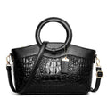Fabric ladies shoulder handbag showing zipper compartments in one of six available colours