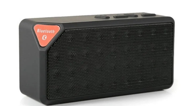 Cannon X3 small cube wireless Bluetooth speaker in five colour options on a white background.