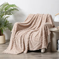 Shu Cotton Velvet Jacquard reversible throw blanket in fog blue colour showing solid and patterned sides