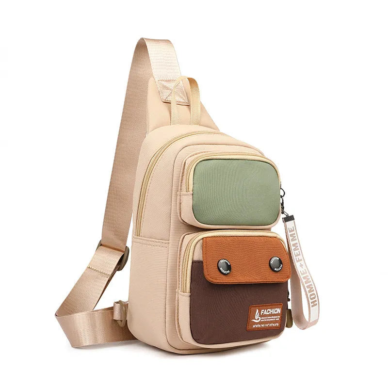 Nylon crossbody shoulder bag in black with contrast colour detailing and letter pattern