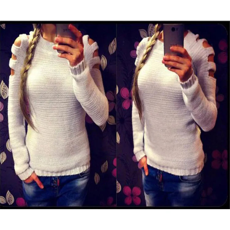 Women's grey rabbit fur hollow-out knitted long sleeve pullover shirt on a hanger.