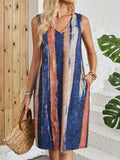 Sleeveless V-neck dress with colour-block striped pattern in mid-waist silhouette