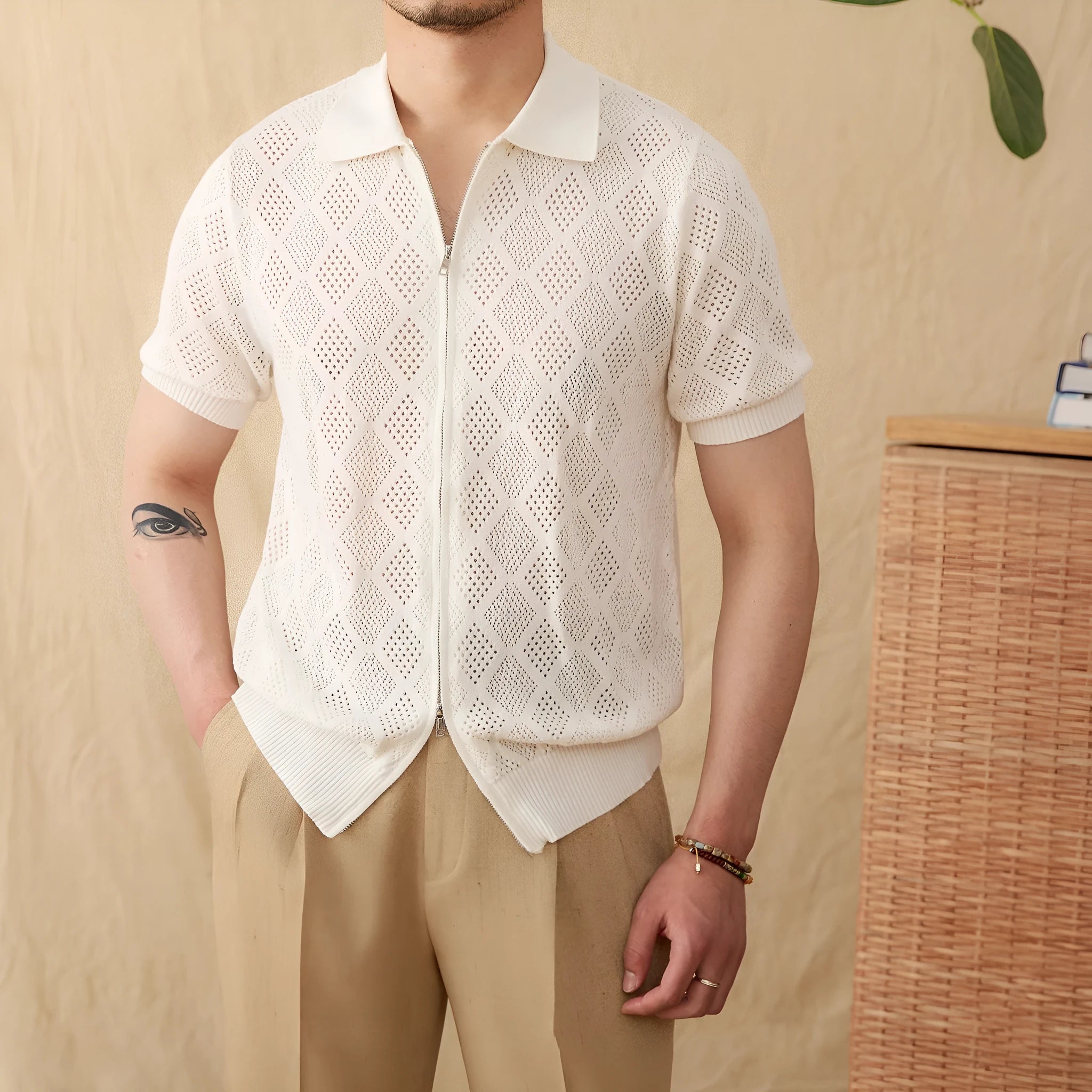 Light brown cotton cardigan with lapel collar, short sleeves, and a front zipper