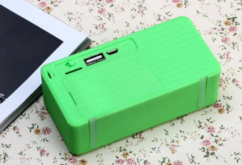 Cannon X3 small cube wireless Bluetooth speaker in five colour options on a white background.