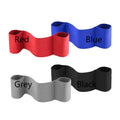 Elastic elbow support bandage in black, shown wrapped around an elbow, for boxing and exercise.
