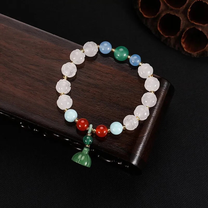 Carved pumpkin lotus Bodhi root bracelet with white jade beads and multiple dimensions