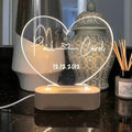 Personalised acrylic LED night light showing custom names and date, modern art design, 20cm by 11.5cm