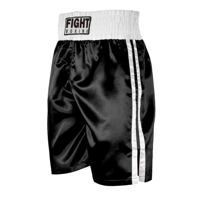 Boxing shorts for kickboxing in black and gold colour combination on a size chart.