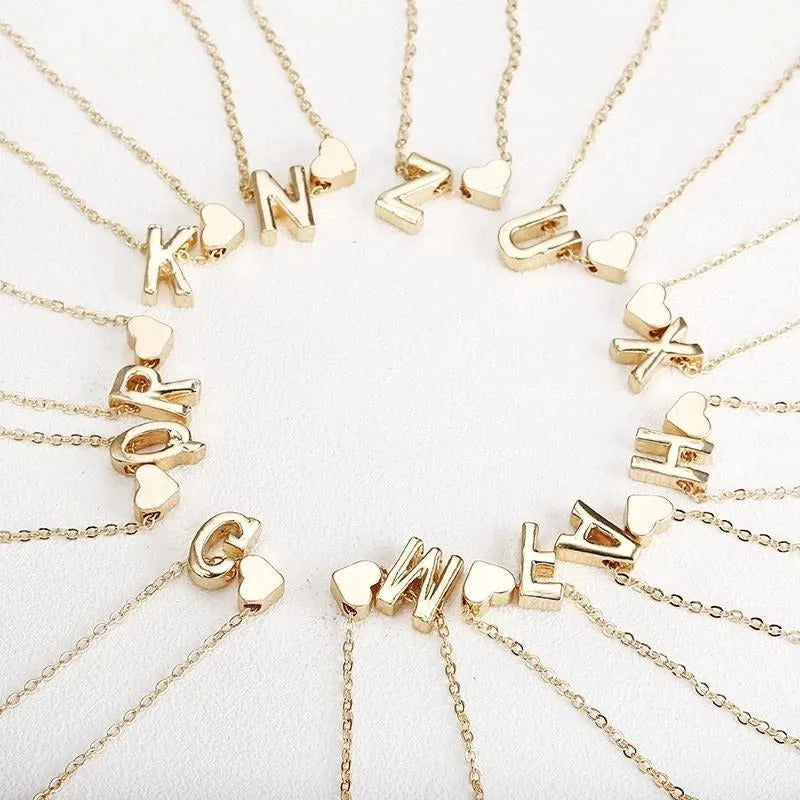 Peach-shaped alloy necklace pendant in a gold finish on a chain.