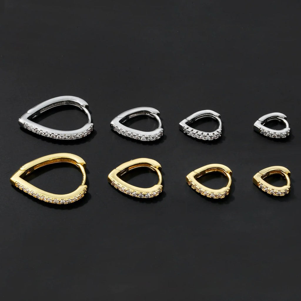 Geometric copper love ear clip with electroplated gold finish and heart design.