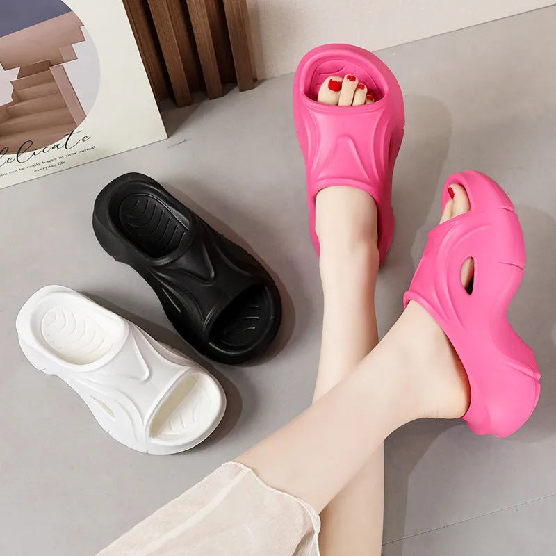 Women's EVA thick-soled slippers in white, black, and rose red colours with round toe design