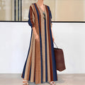 Women's camel coloured vertical striped V-neck knit dress with A-line silhouette and long sleeves