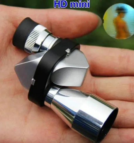 Compact black aluminium alloy 8x20 pocket monocular telescope with folded rubber eyecup on a cloth.
