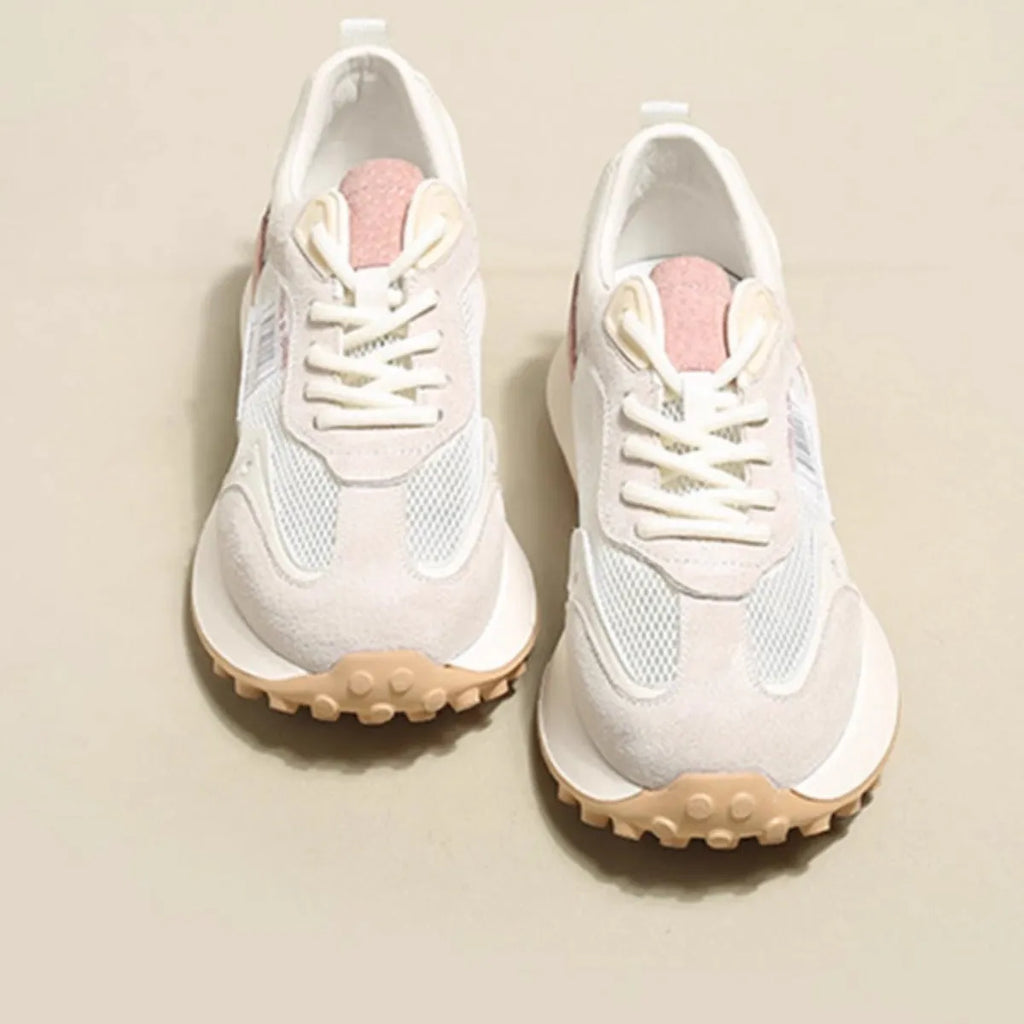 Women's low-top retro sneaker in grey with round toe, rubber sole, and shallow-cut design under 7cm.