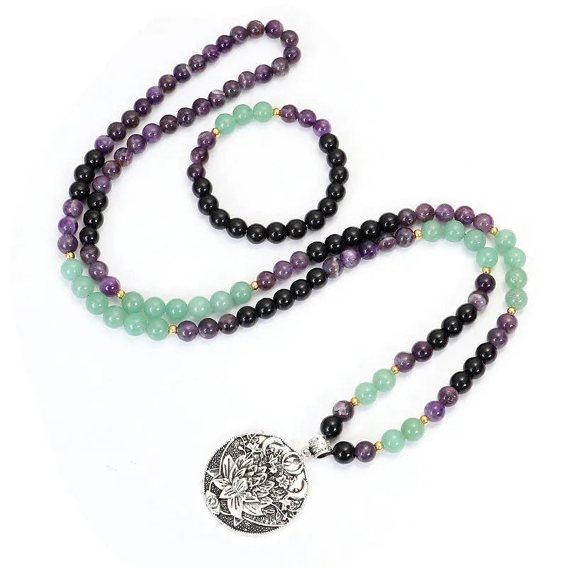 Handmade stone bead necklace with geometric alloy lotus pendant and matching adjustable bracelet.