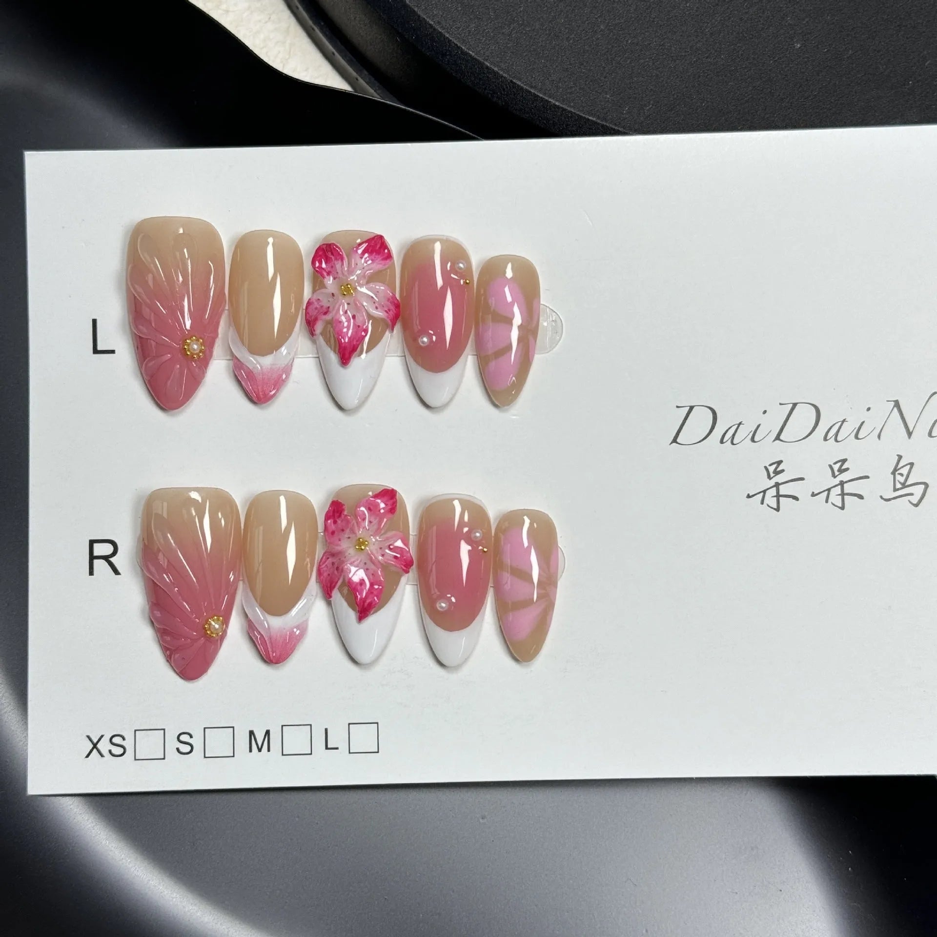 French style 3D lily ice flower design on almond-shaped plastic false nails.