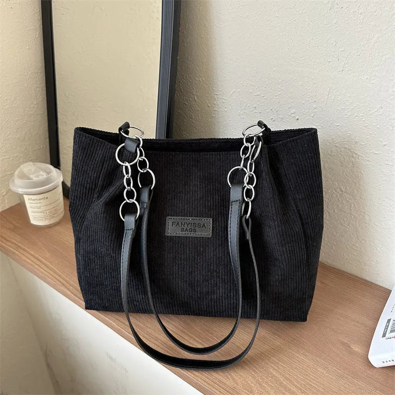 Corduroy one-shoulder tote handbag in horizontal square shape with three-dimensional pockets