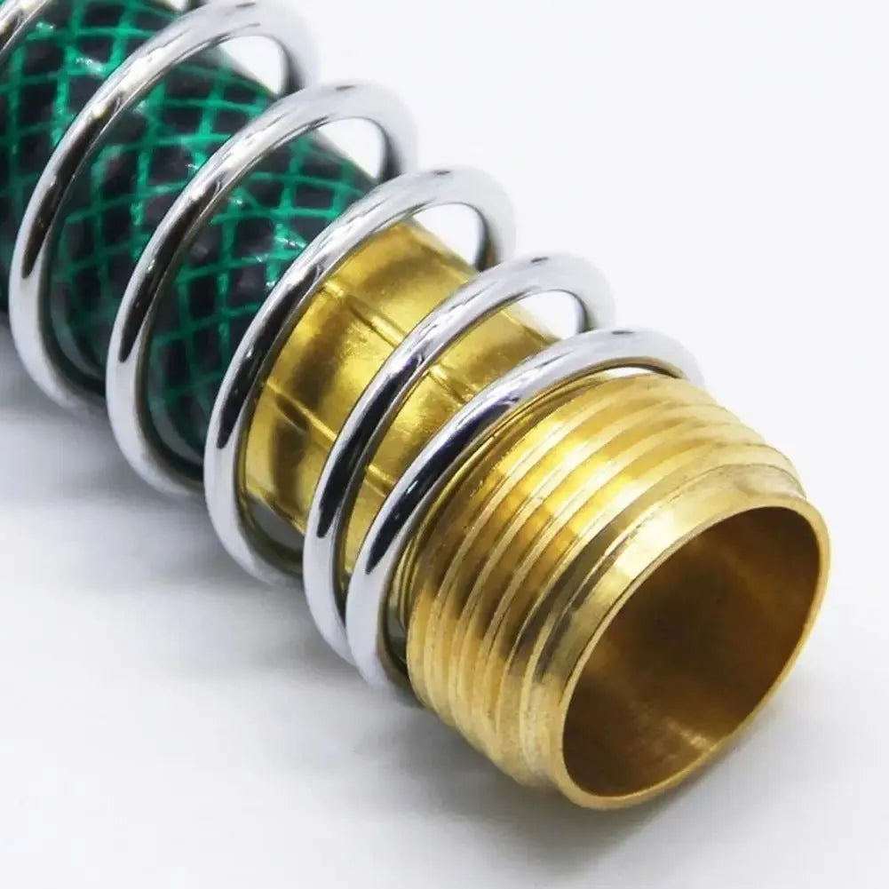 Brass garden hose connector with visible spiral spring, 15 cm long with 3/4 inch threaded fittings
