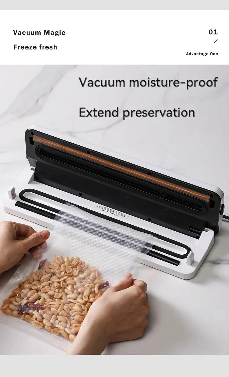 Small white automatic vacuum sealer machine for home food preservation on a kitchen counter.