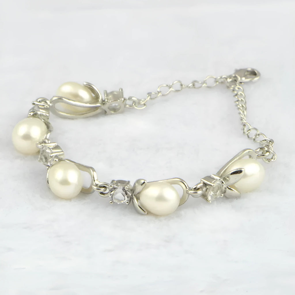 Freshwater pearl bracelet with Korean crown design on white background