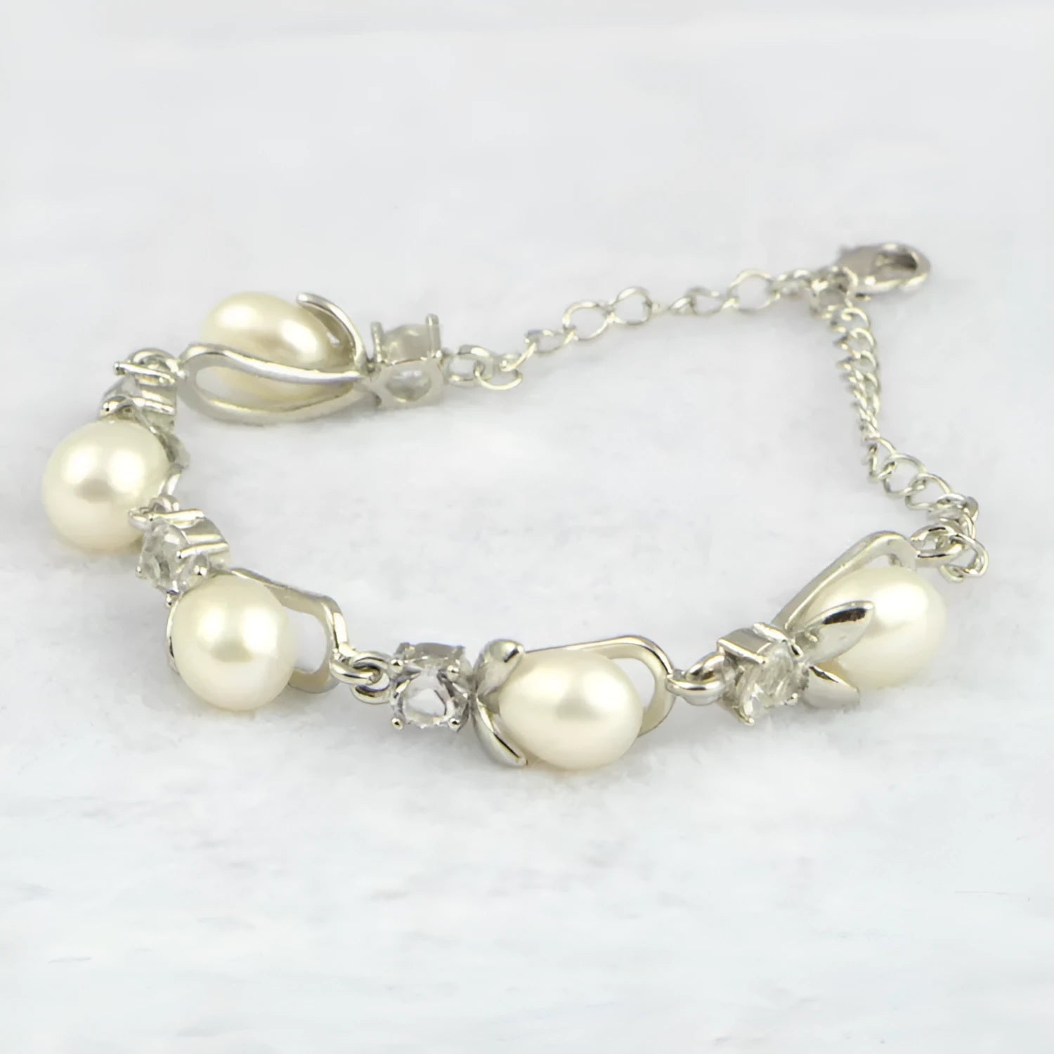 Freshwater pearl bracelet with Korean crown design on white background