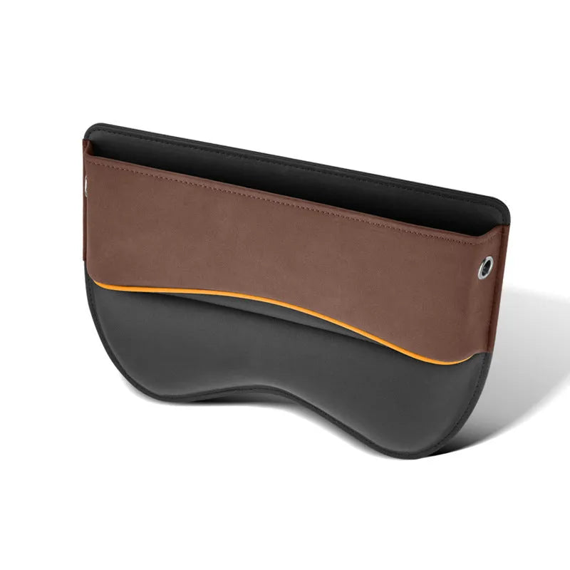 Leather car seat storage box in beige colour on a car seat.