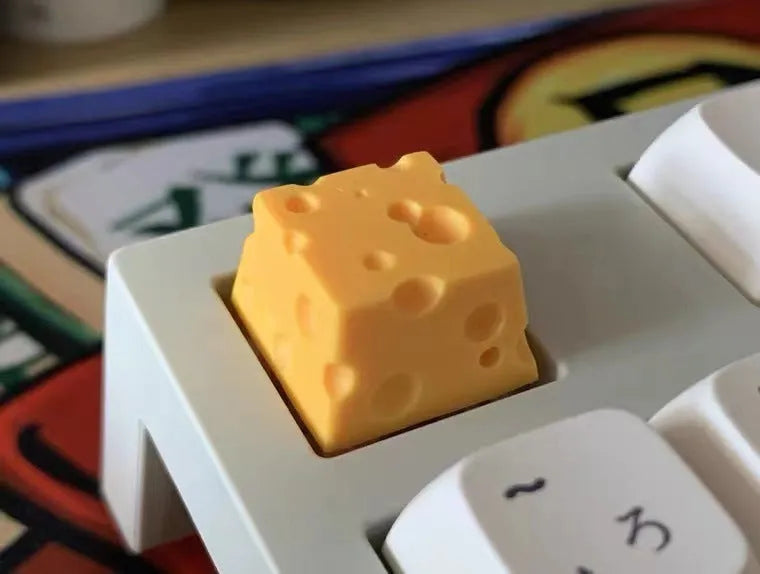 Yellow resin cheese artisan keycap for mechanical keyboards with 3D sculpted design
