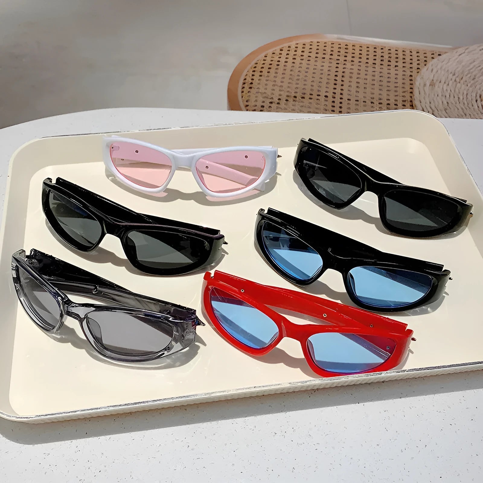 Sports sunglasses with windproof design in multiple colour combinations including black frame with blue lenses