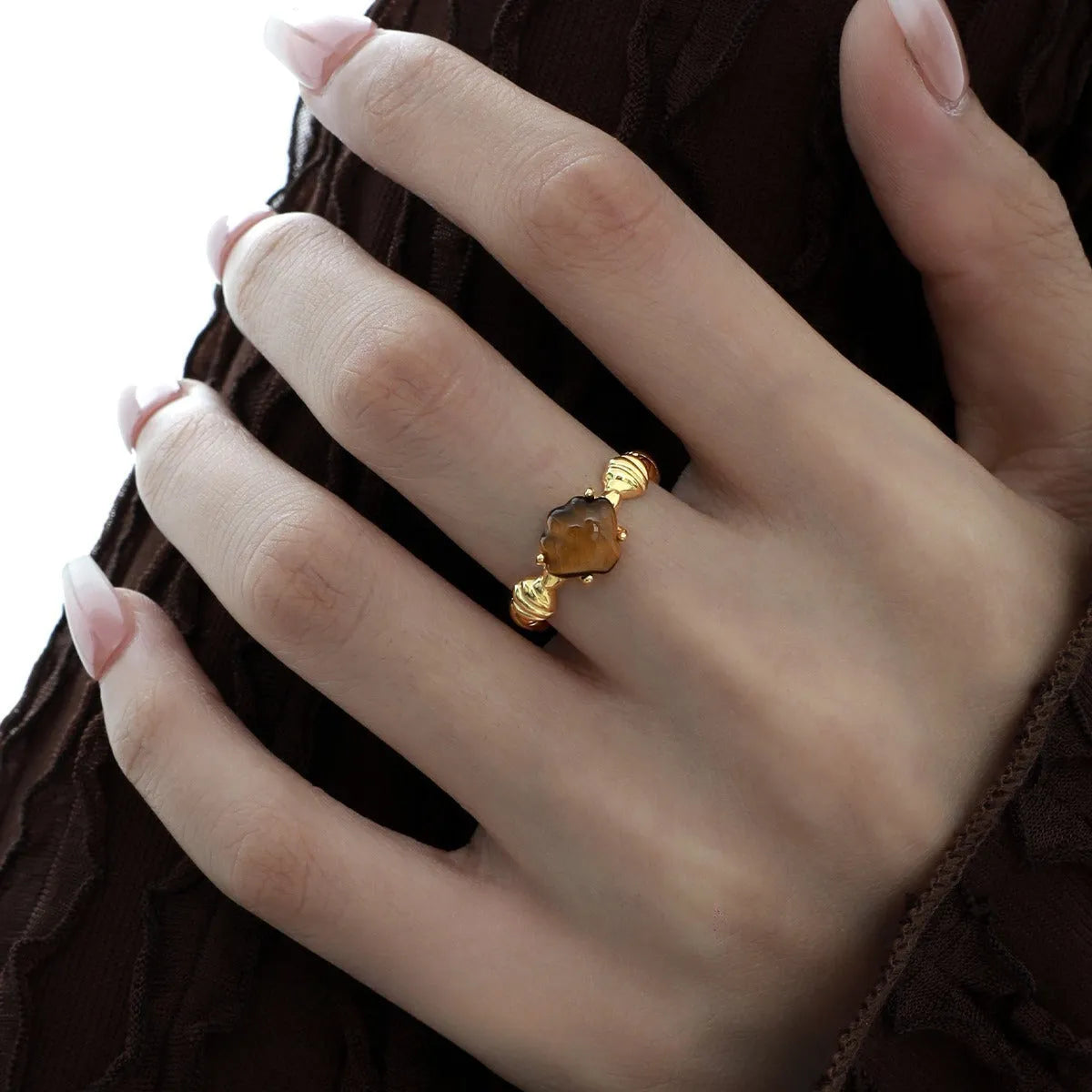 Adjustable silver ring with shell design and tiger eye stone in white gold plating