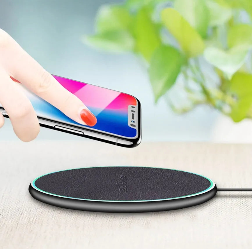 Qi wireless charging pad for iPhone 11 with non-slip silicone ring and included USB-C cable