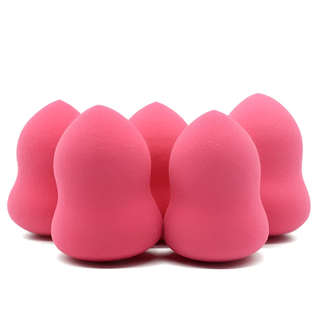 Pink makeup foundation sponge with soft texture measuring 4cm by 4cm by 5.6cm