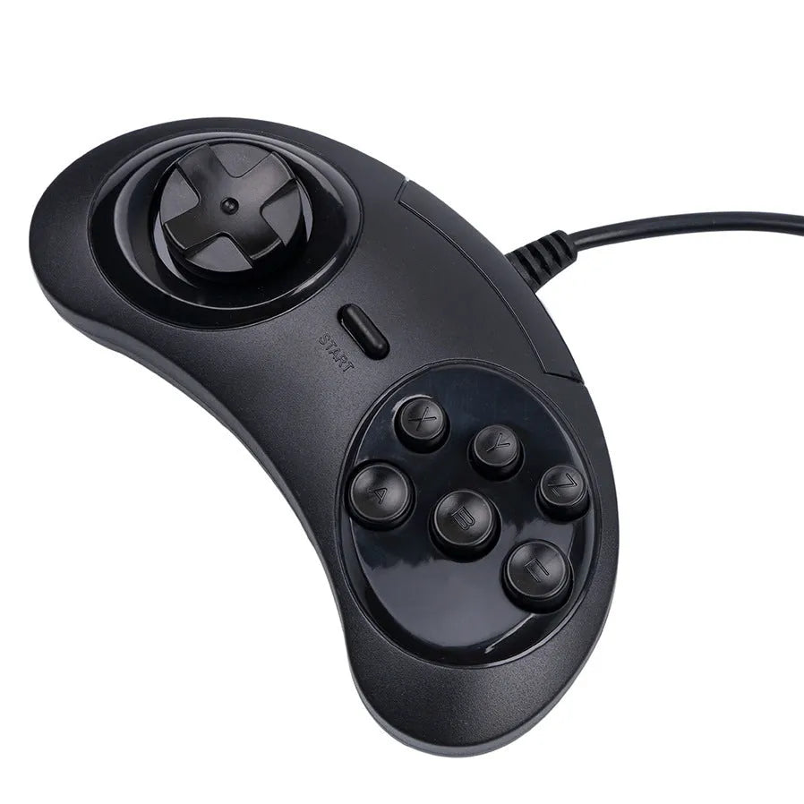 Black Sega USB PC gaming controller with long cable on a desk.