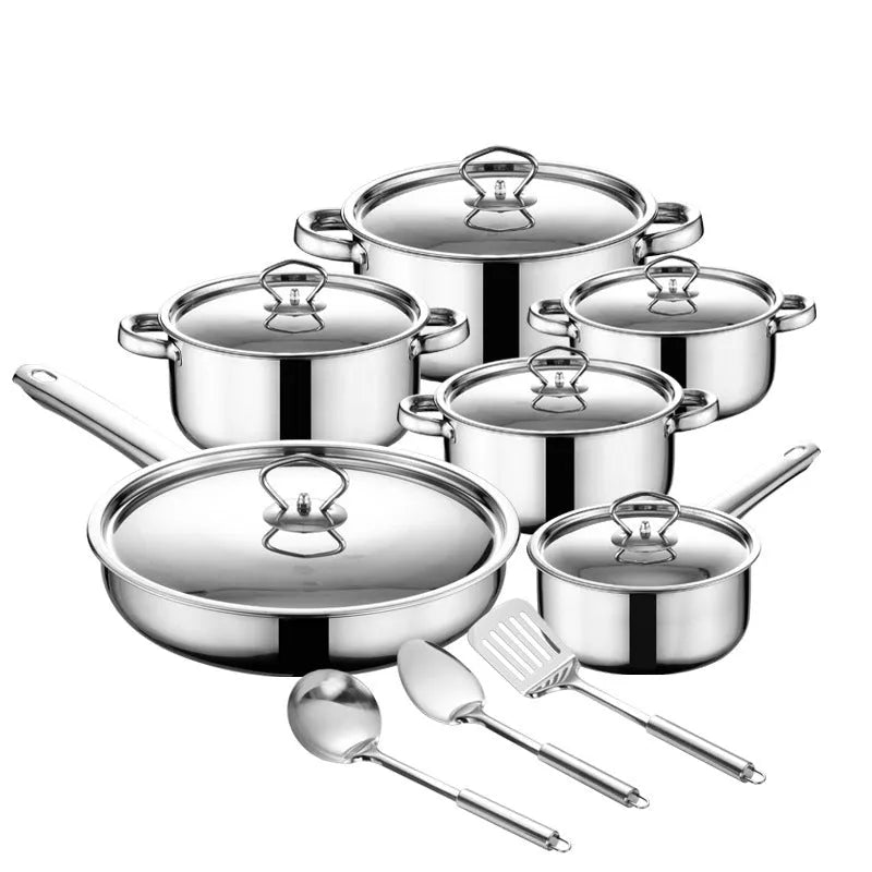 Stainless steel cookware set 15-piece with non-stick pan and glass lids on a countertop