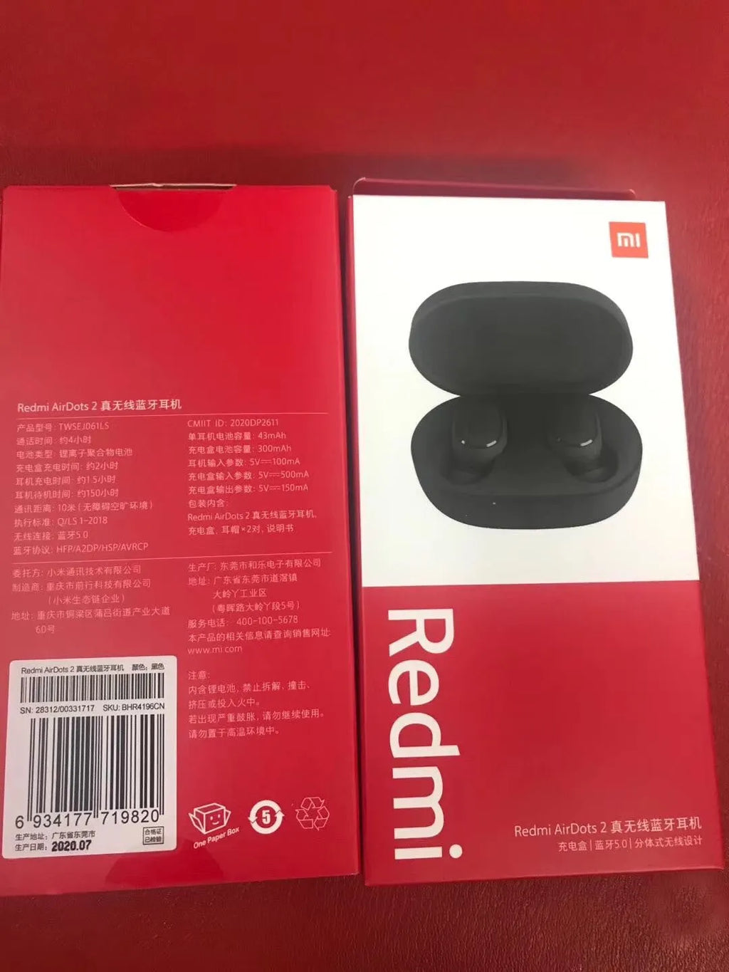 Redmi AirDots True Wireless black earbuds and charging case with three earplug sizes.