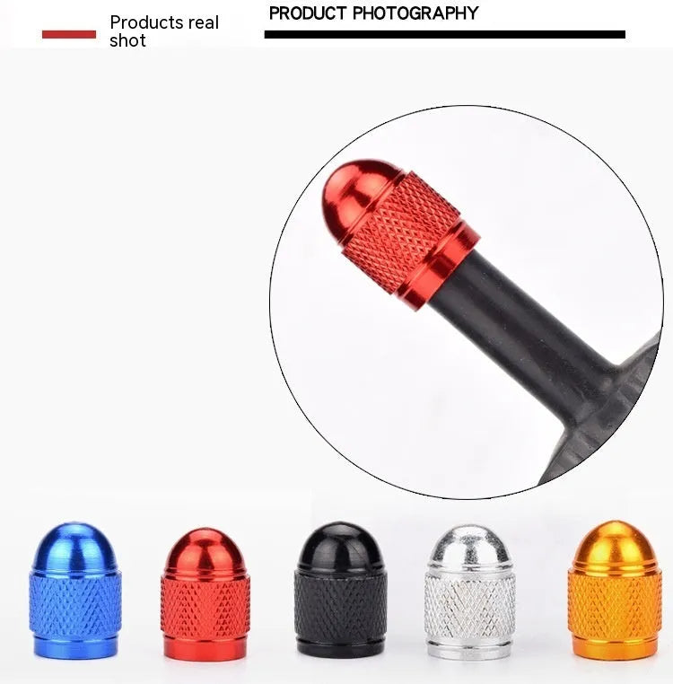 Aluminium mountain bike tyre valve cap in black, blue, gold, red, and silver colours.