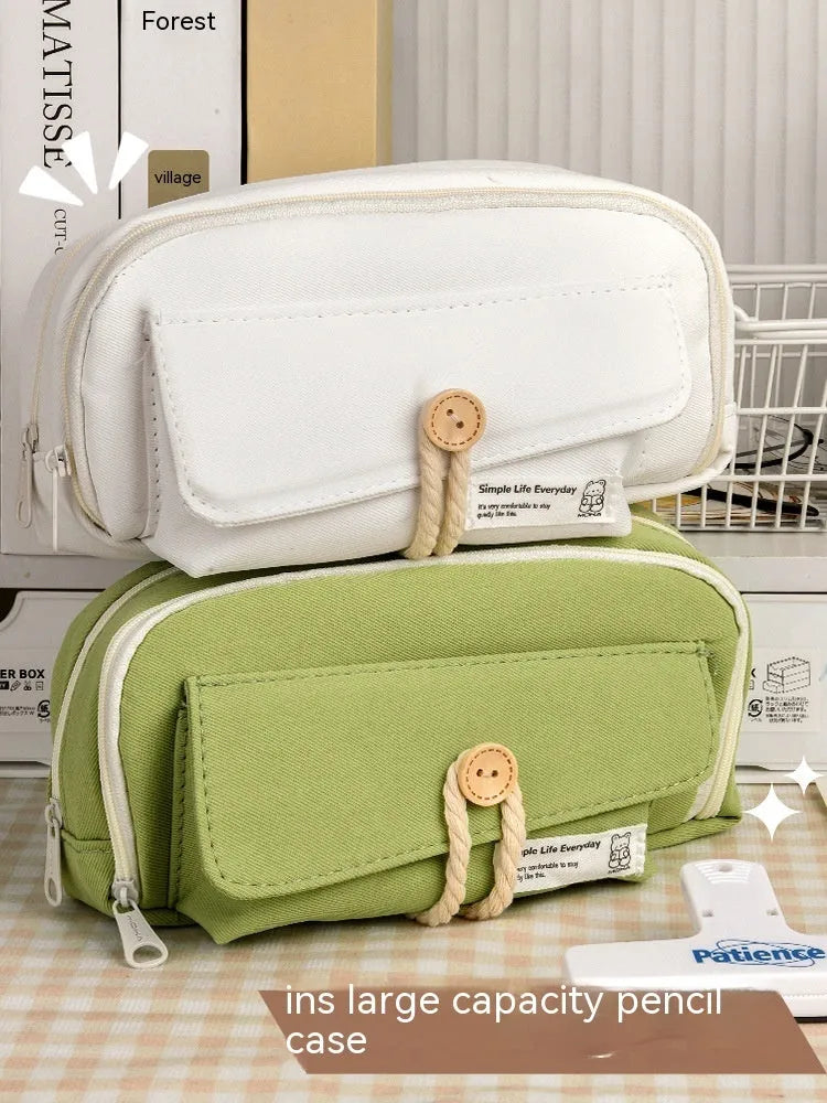 Green Korean-style canvas pencil case with zip, large enough to hold 80 pens.