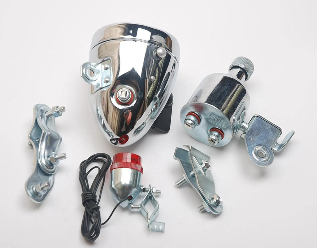 Silver bicycle dynamo generator light mounted on bicycle frame for friction-powered front and rear illumination