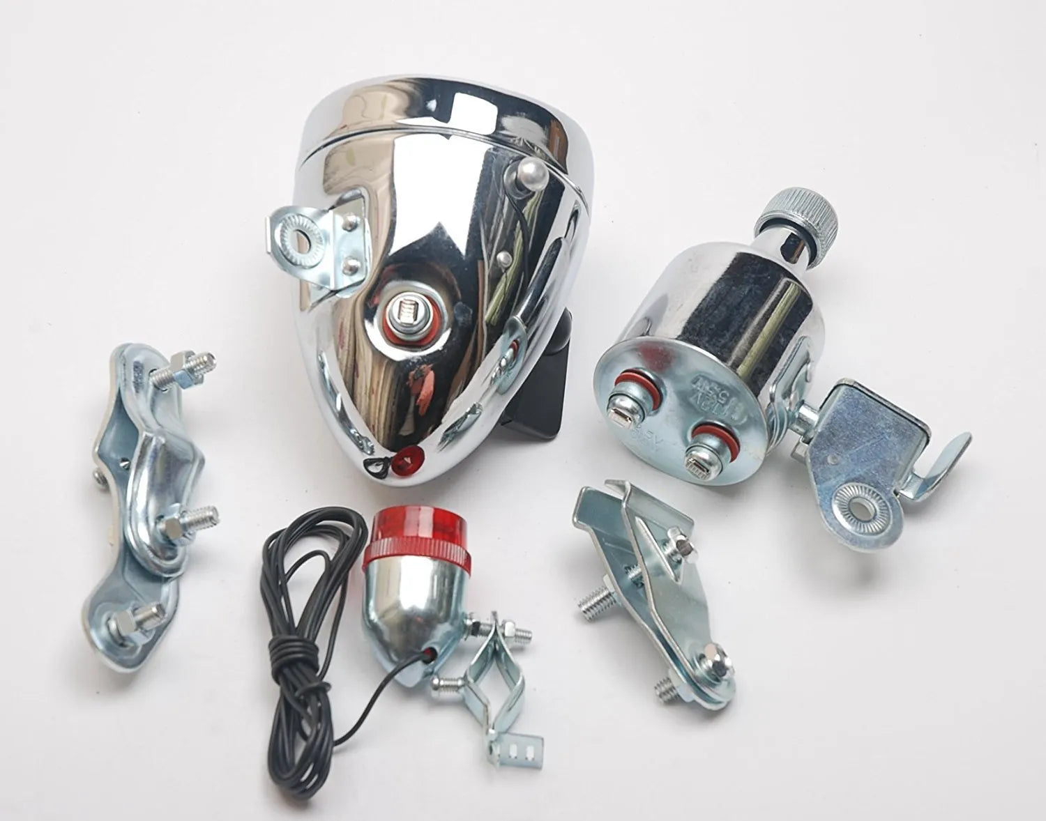 Silver bicycle dynamo generator light mounted on bicycle frame for friction-powered front and rear illumination