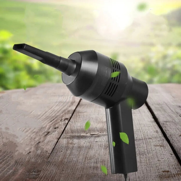 Black desktop mini vacuum cleaner with 4W power rating on a desk surface