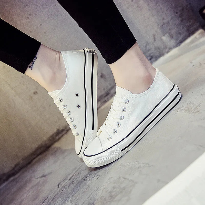 Women's solid colour canvas summer shoes available in black, white black, white red, and all black colour options.