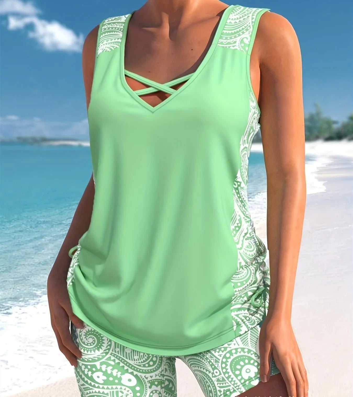 Women's two-piece swimsuit set with a top and split boxer shorts in a printed or solid colour.