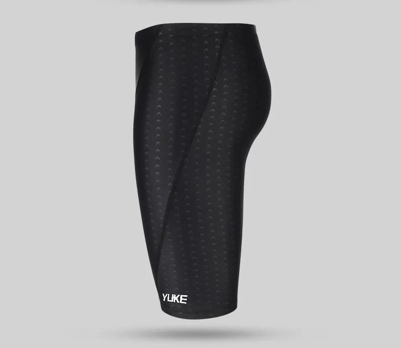 Men's black swimming set with trunks, anti-fog goggles, waterproof cap, ear plugs with nose clip, and carry bag