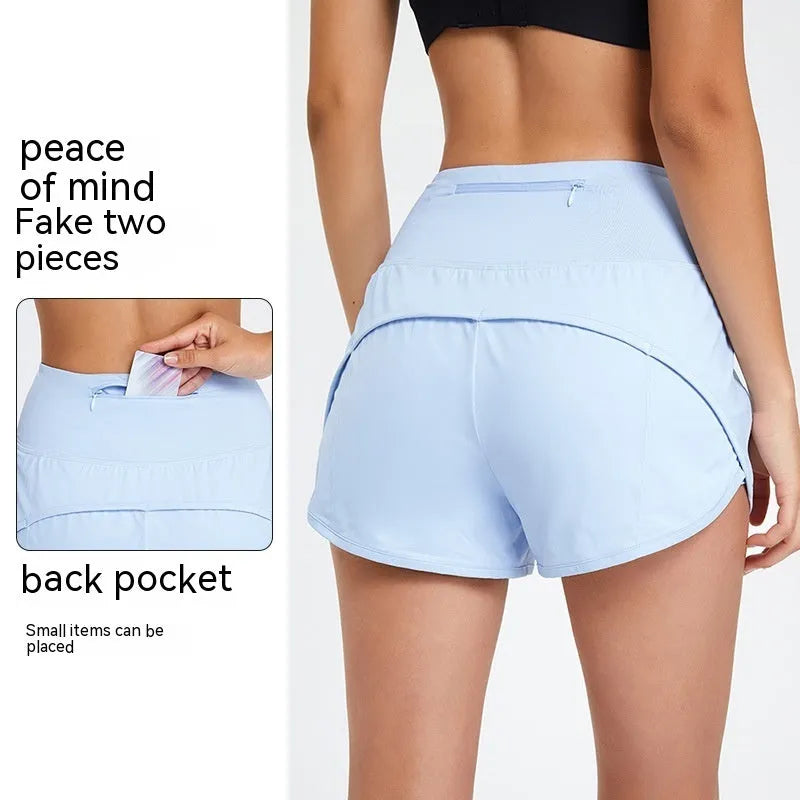 Women's black high waist nylon fitness shorts for running and gym workouts.