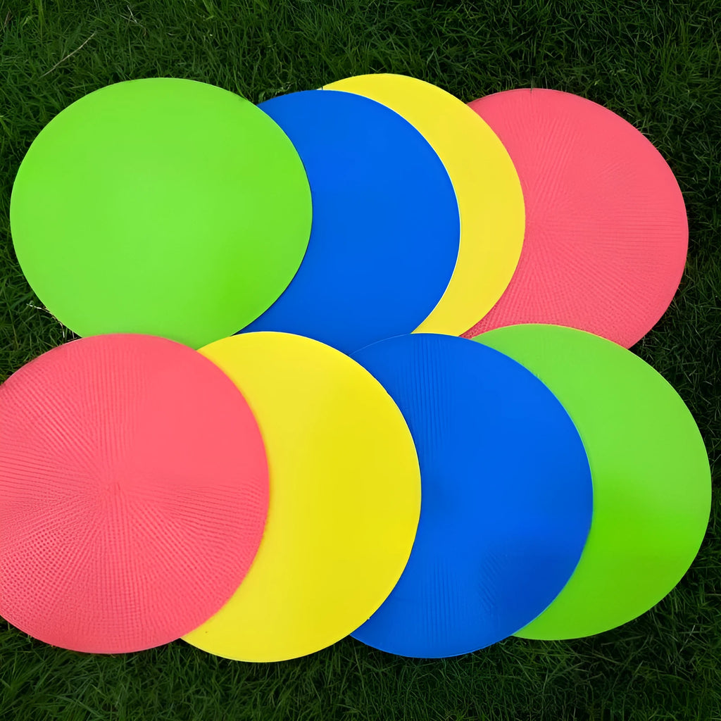Soft yellow TPE football training disc on grass, showing 23cm diameter flat marker.
