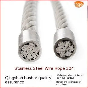 Coiled 304 stainless steel anti-theft security cable with coated finish on a grey background.